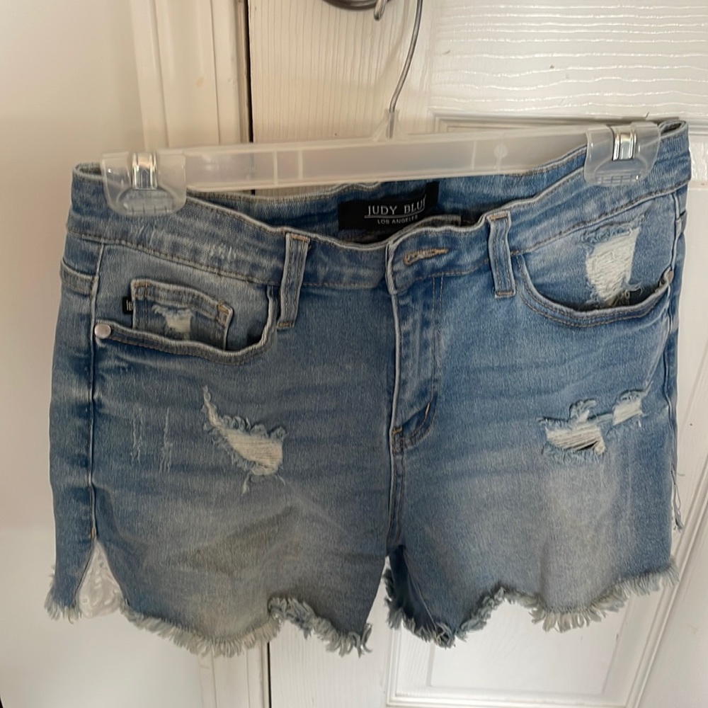 Judy Blue denim shirt with lace cut out on the side.